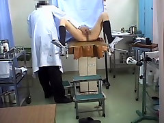 Beautiful jav vodcasten gets her slit fingered during medical exam