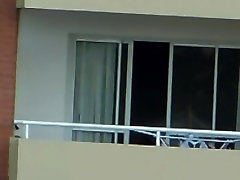 voyeur girl nude in balcony argentina . far away 200 m