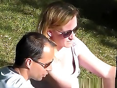 Insight into the neck of a woman in a meadow