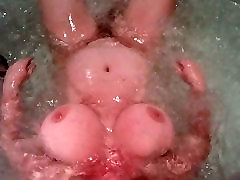 bbw jen in a jacuzzi with her nice big boobs