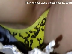 Pussy slipped out of a yellow thong