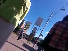 Upskirt on the street. Pink panties and black stockings