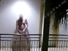 Exhibitionist jerks off on a Motel balcony