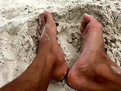 FEET IN THE SAND CAUGHT CUMMING ON BEACH