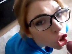 Little Redhead Is On Her Knees Chewing On A Big Dick And Ea