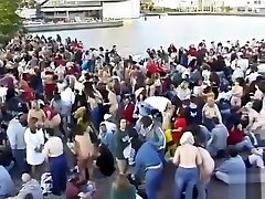 Hundreds of nudists strip for a camera man