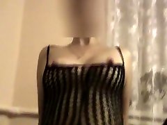 Brunette in Bodystockings Sucks Cock