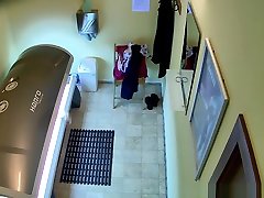 Older MILF Tanning her Shaved Tight Pussy