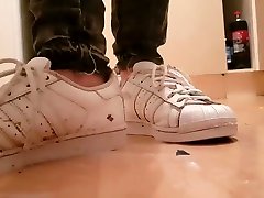Stepping & Spitting In Well Worn White Adidas Trainers and Gold Boots