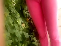 Filming micro skirt candid of chick in pink yoga pants
