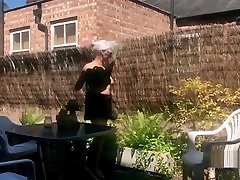Louise gathering the plants naked
