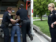 Horny milf cops suck on suspects cock inside moving truck