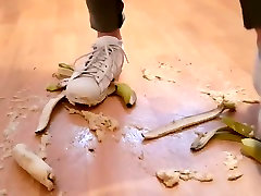 Crushing Juicy Bananas In Well Worn White Adidas Trainers