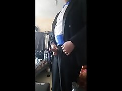 wearing tuxedo with bow and blue colored gown