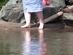 On megan scott kiss pussy mom and bare feet on the sand, plump legs walk along the shore.