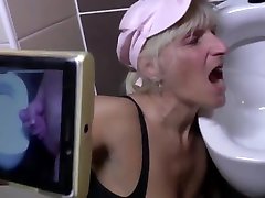 Mature mother broadcasting from mens toilet