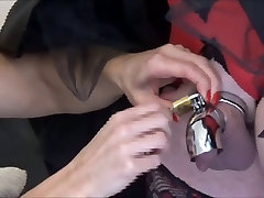 Madame C puts Angelica in metal chastity