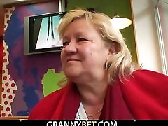 Grandma with huge melons enjoys riding cock