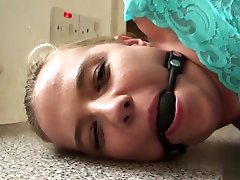 Gagged uk whore drools on cock while sucking