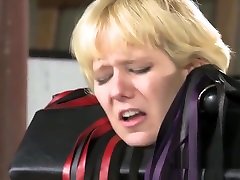 Blonde bound in standing african lingerie flogged