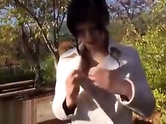 Japanese beauty gives blowjob outdoor