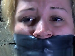 Restrained fem slave caned as punisment