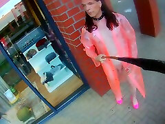 risking exposure in only a red see-thru pvc raincoat