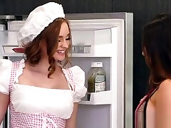 Lesbians in lingerie and apron in kitchen