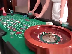 Three amateur babes playing some strip roulette