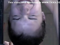 Collared slave pussyclamped while restrained