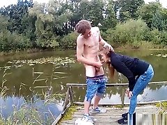 By the lake, the time is perfect for a blowjob