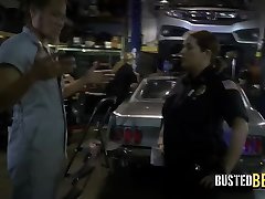 BBC enjoys fucking with two busty and horny female cops at his garage.