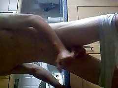 sexy guy masterbates in kitchen