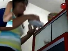 Cute babe fucks her ass with a huge dildo while on the job