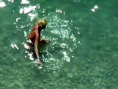 Nude lovers caught on beach cams
