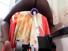 Ebony Noemie Bilas takes on a dildo on sex machine ATK