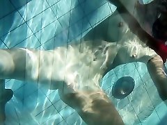 Mia babe swimming naked in the pool