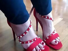 Feet with red shoes