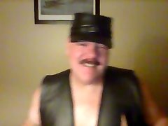 leather, chaps, documentales pornos piece, gloves, cap, cigar