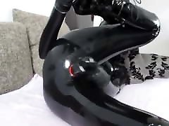 Girl in Latex using Dildo