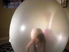 Pop and masturbing inside giant balloon