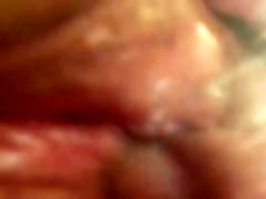 Horny granny fingers her tight pussy