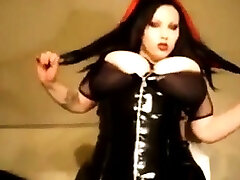 Gothic beauty with lick my heels tits