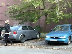 Squatting Between Parked Cars To Piss In Public