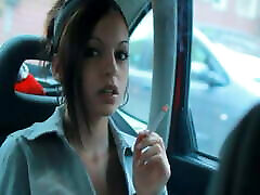 Lady Smokes in Car with Windows Up