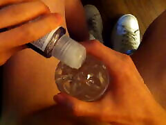 Jon Arteen lubes a Fleshlight Quickshot Vantage and wanks