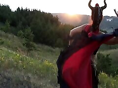 Maleficent on sunset sky