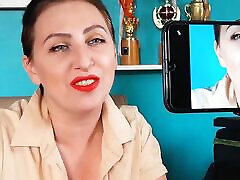 Red lipstick kissing and teasing by Regina Noir.