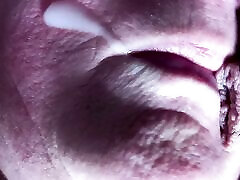 Her mouth gets filled with cum and she swallows