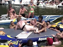 Lake party babes have a bit of lesbian sex for a big crowd